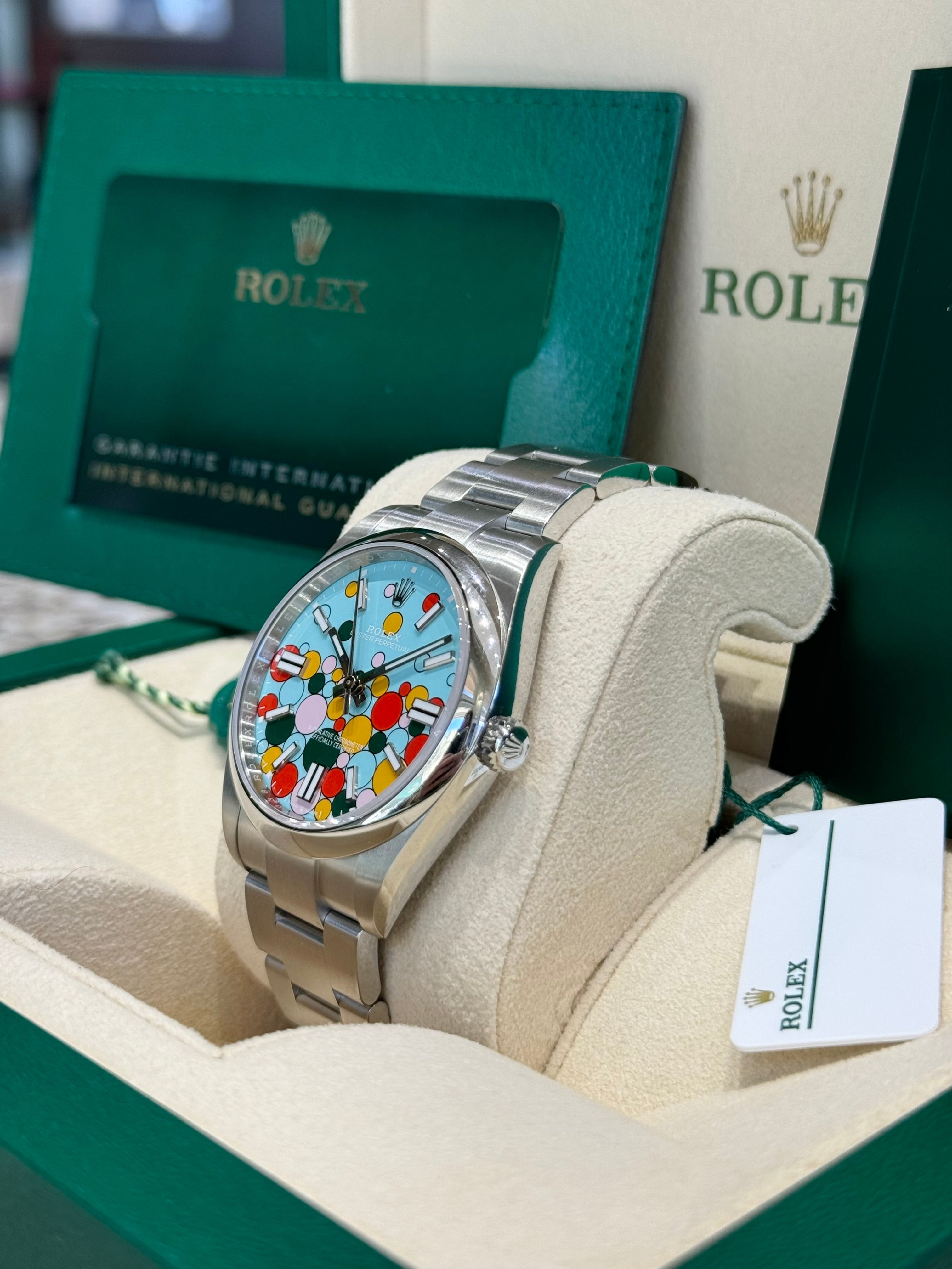 Rolex Oyster Perpetual 41 124300 Turquoise Celebration Dial Watch