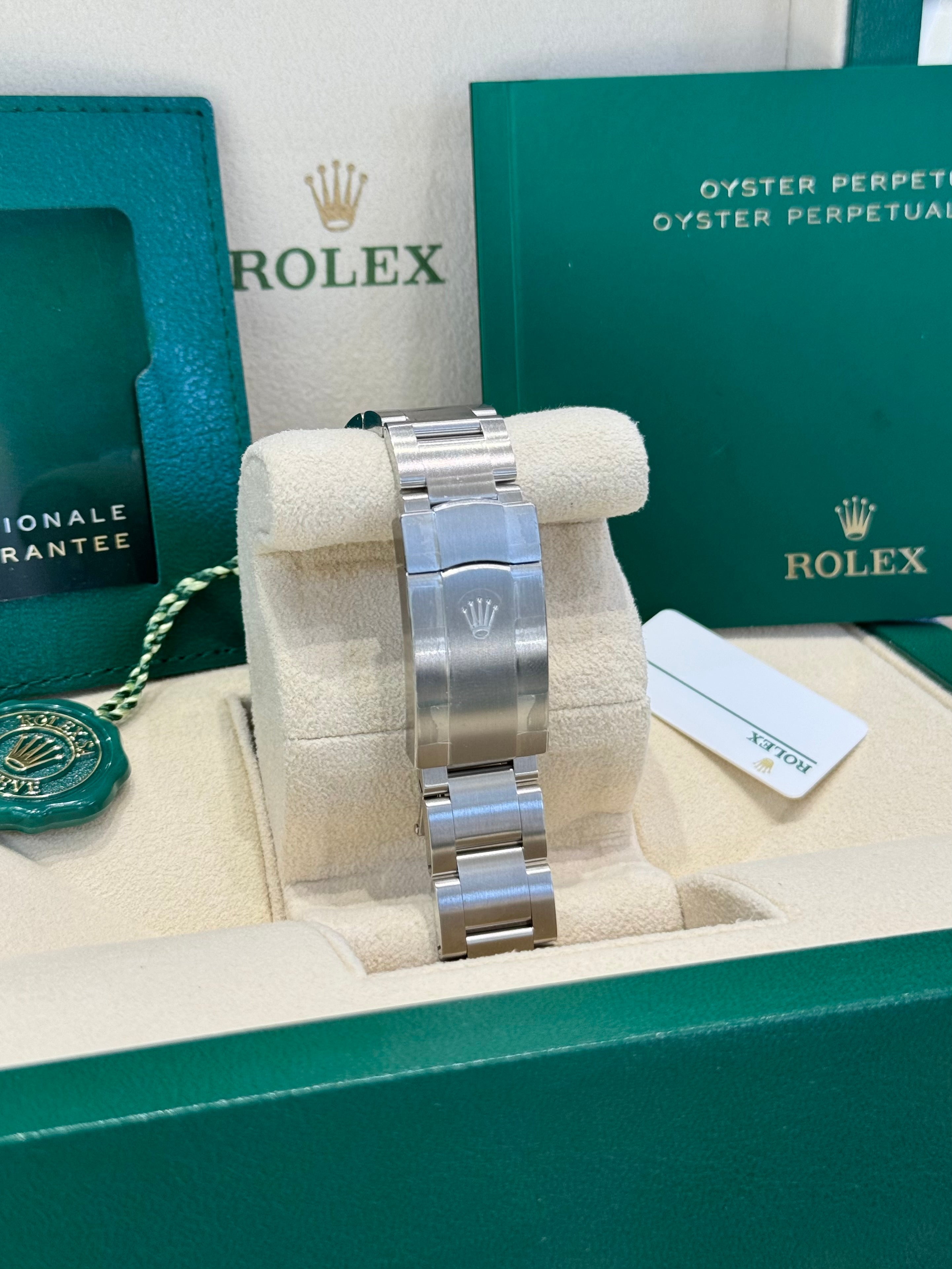 Rolex Oyster Perpetual 41 124300 Turquoise Celebration Dial Watch