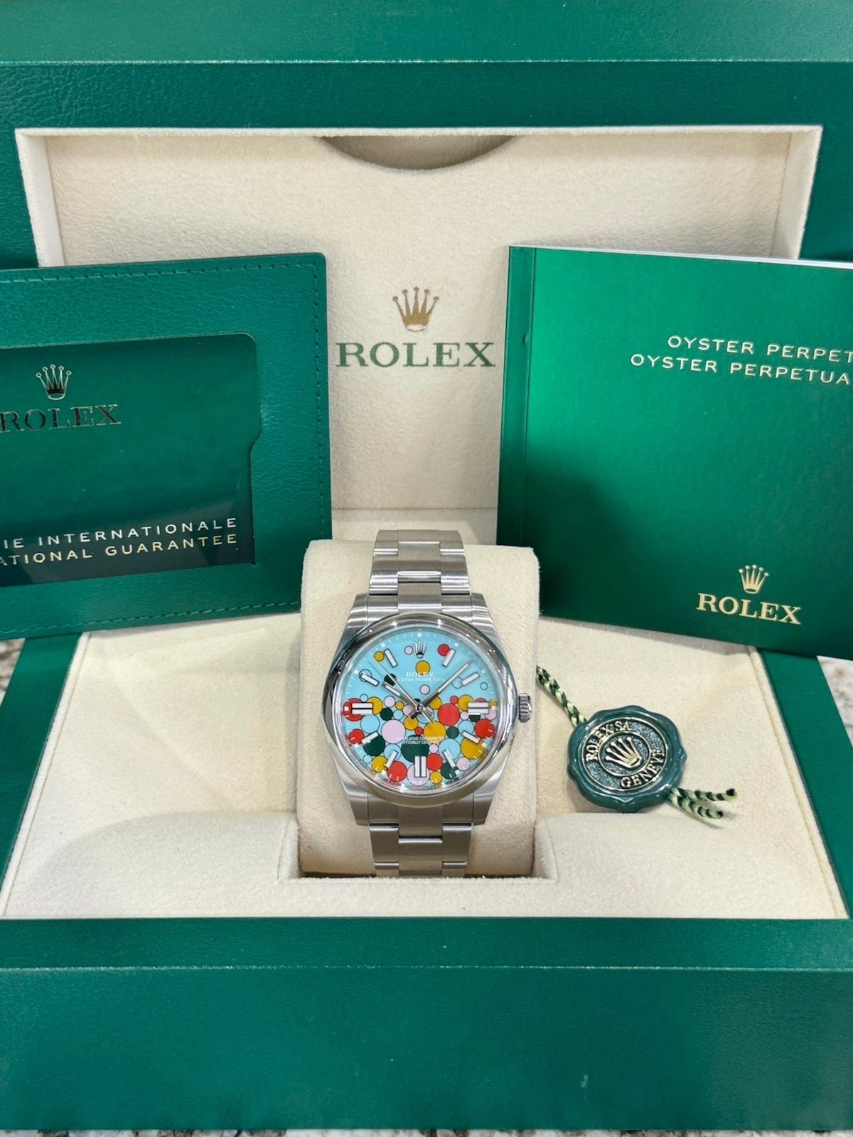 Rolex Oyster Perpetual 41 124300 Turquoise Celebration Dial Watch