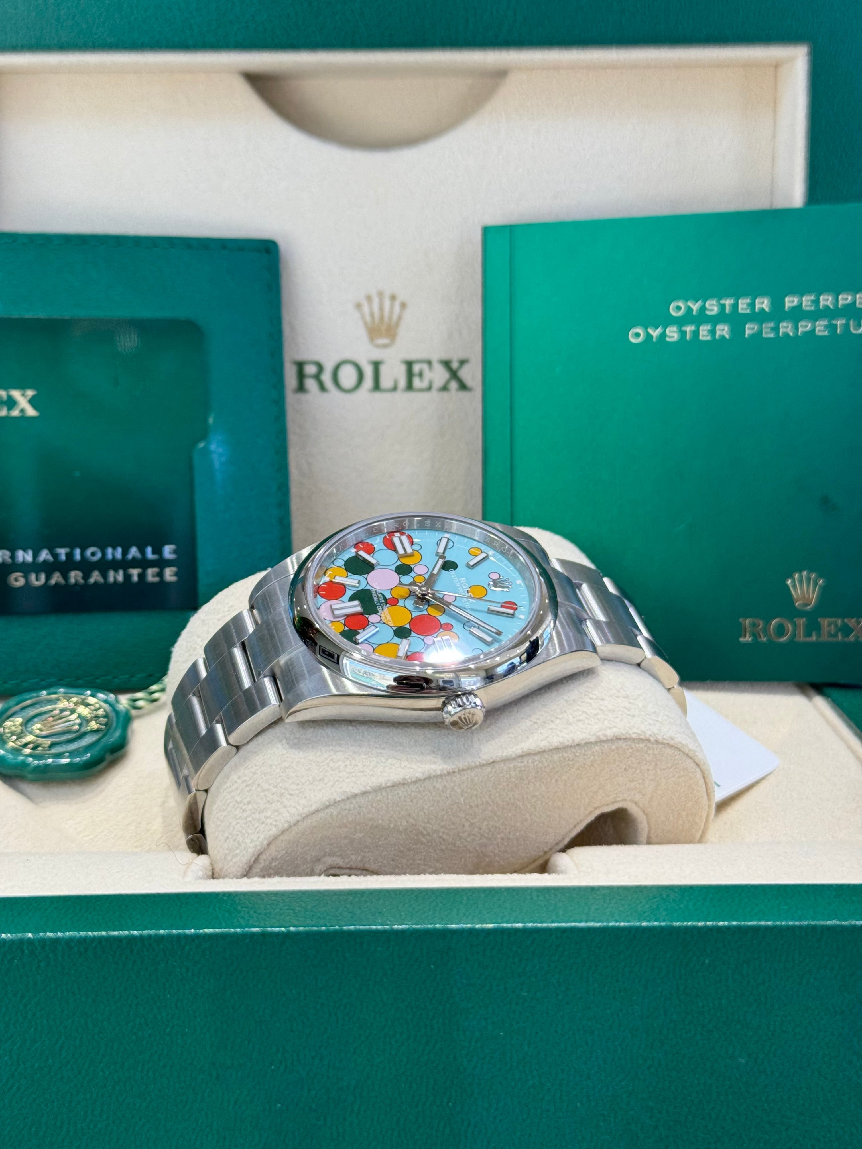 Rolex Oyster Perpetual 41 124300 Turquoise Celebration Dial Watch