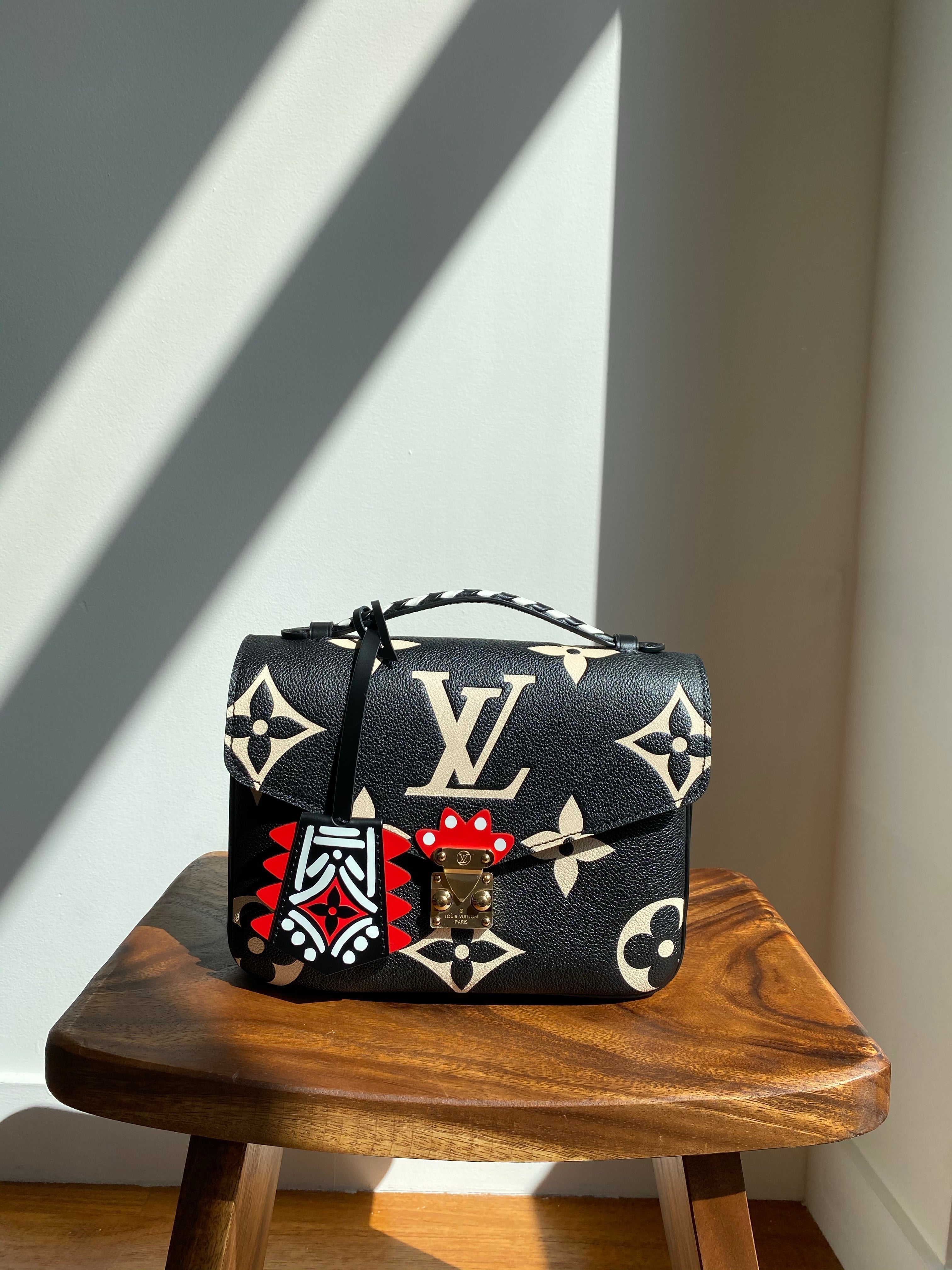 Louis Vuitton LV Crafty Pochette Metis Black Embossed Leather M45385
